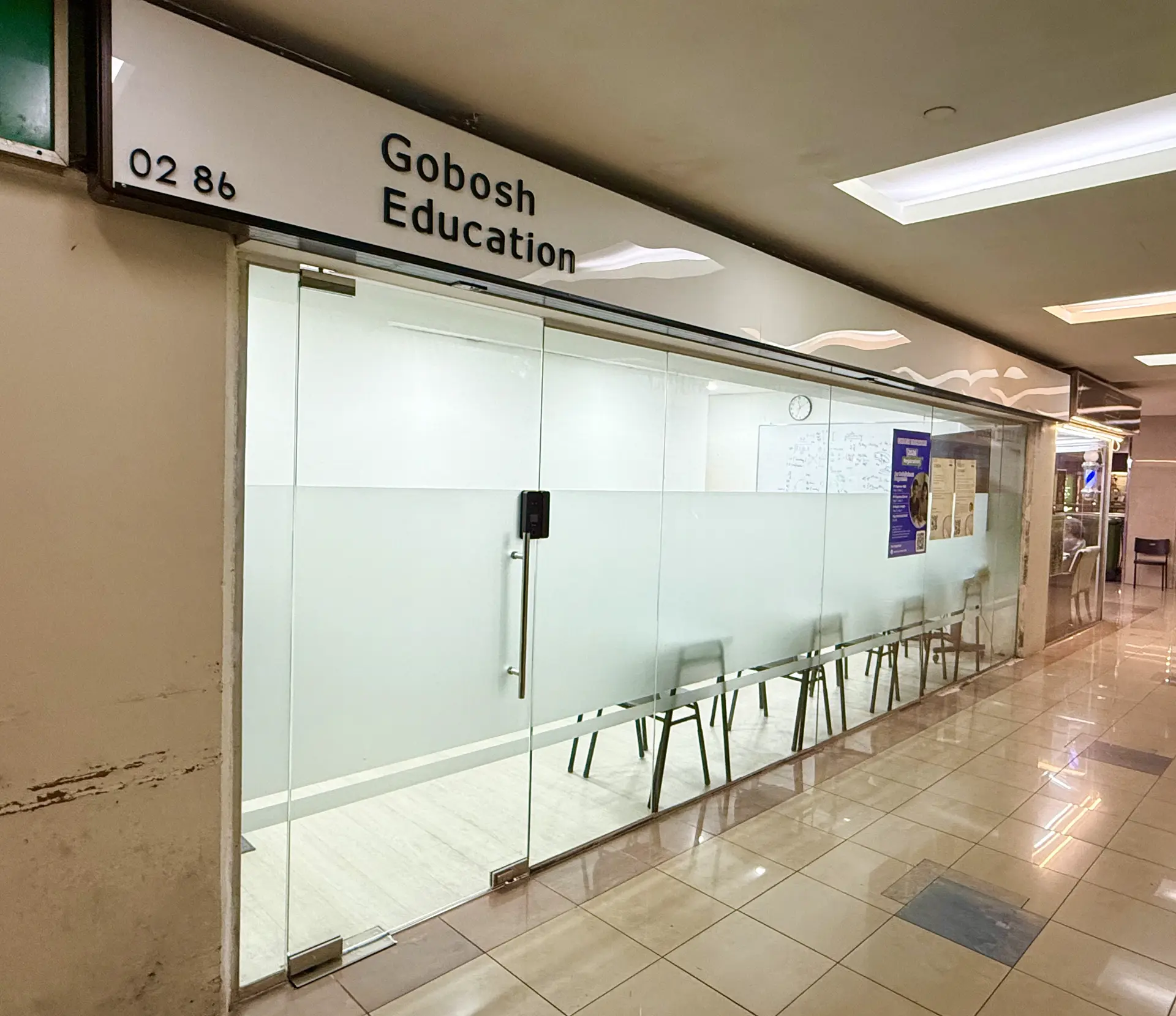 Exterior glass storefront of Gobosh Education tuition centre at Katong Shopping Centre unit 02-86